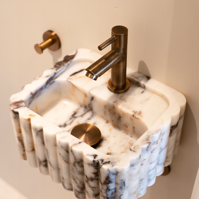 Luxury natural stone basin in renovated toilet