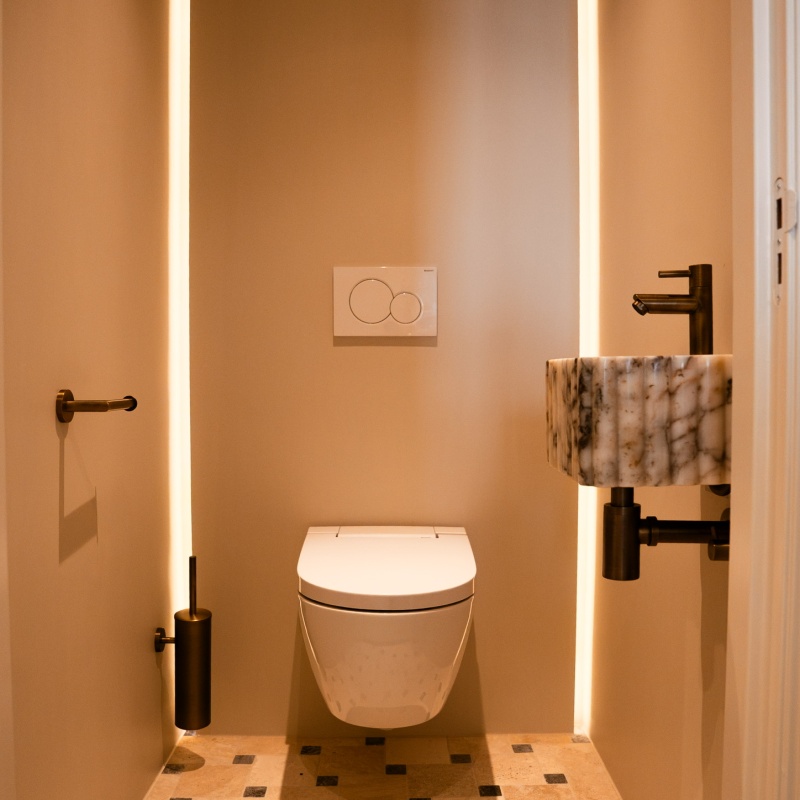 Modern toilet with LED lighting after full renovation