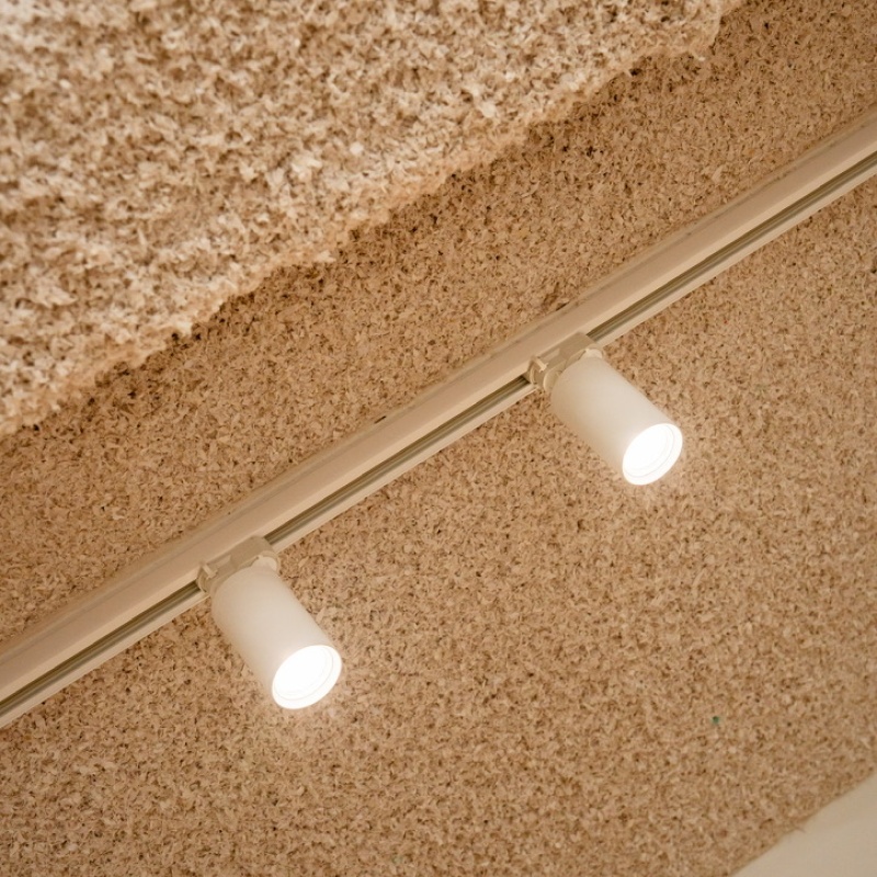 Detail of the sprayed-concrete ceiling with spotlights