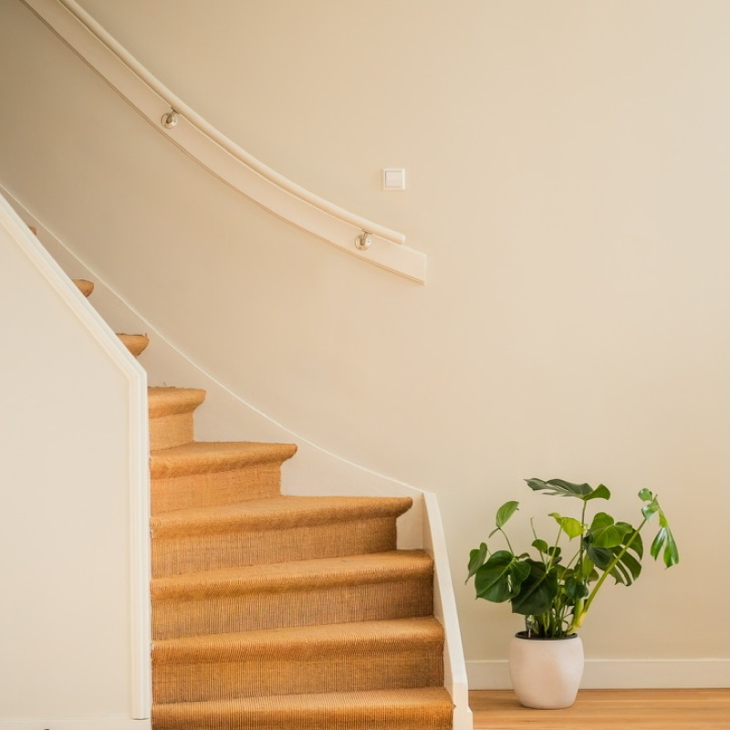 Staircase renovation with new upholstery in historic home